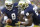 FILE - In this Saturday, Sept. 5, 2015 file photo, Notre Dame quarterback Malik Zaire, left, hands off to running back Tarean Folston during the first half of an NCAA college football game against Texas in South Bend, Ind. Zaire played brilliantly in a season-opening 38-3 rout of Texas last year but broke his ankle a week later against Virginia and missed the remainder of the season. With Zaire healthy again and DeShone Kizer back as well, No. 10 Notre Dame has an uncertain quarterback situation as it heads into the season.  (AP Photo/Nam Y. Huh, File)