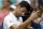 Novak Djokovic, of Serbia, motions after Mikhail Youzhny, of Russia, retired from their match in the first set during the third round of the U.S. Open tennis tournament, Friday, Sept. 2, 2016, in New York. (AP Photo/Jason DeCrow)