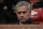 Manchester United's Portuguese manager Jose Mourinho awaits kick off in the English Premier League football match between Manchester United and Manchester City at Old Trafford in Manchester, north west England, on September 10, 2016. / AFP / Oli SCARFF / RESTRICTED TO EDITORIAL USE. No use with unauthorized audio, video, data, fixture lists, club/league logos or 'live' services. Online in-match use limited to 75 images, no video emulation. No use in betting, games or single club/league/player publications.  /         (Photo credit should read OLI SCARFF/AFP/Getty Images)