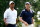 AKRON, OH - JULY 30:  Tiger Woods (L) and Matt Kuchar walk down the third hole during a practice round for the World Golf Championships-Bridgestone Invitational at Firestone Country Club South Course on July 30, 2014 in Akron, Ohio.  (Photo by Sam Greenwood/Getty Images)