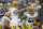 Green Bay Packers quarterback Aaron Rodgers (12) calls a play during the first half of an NFL football game against the Minnesota Vikings Sunday, Sept. 18, 2016, in Minneapolis. (AP Photo/Andy Clayton-King)