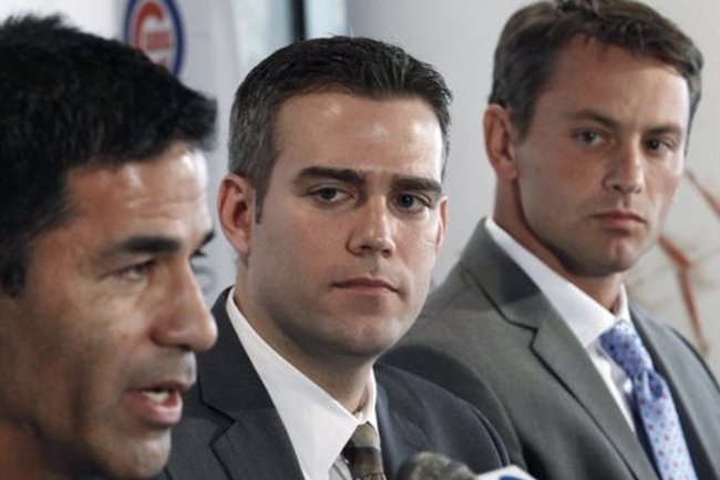 Chicago Cubs president of baseball operations Theo Epstein, center, and new general manager Jed Hoyer, right, listen to new head of scouting and player development Jason McLeod, during a news conference Tuesday, Nov. 1, 2011, in Chicago. Hoyer and McLeod are reuniting with Epstein, who also worked with the pair in Boston. (AP Photo/Charles Rex Arbogast)