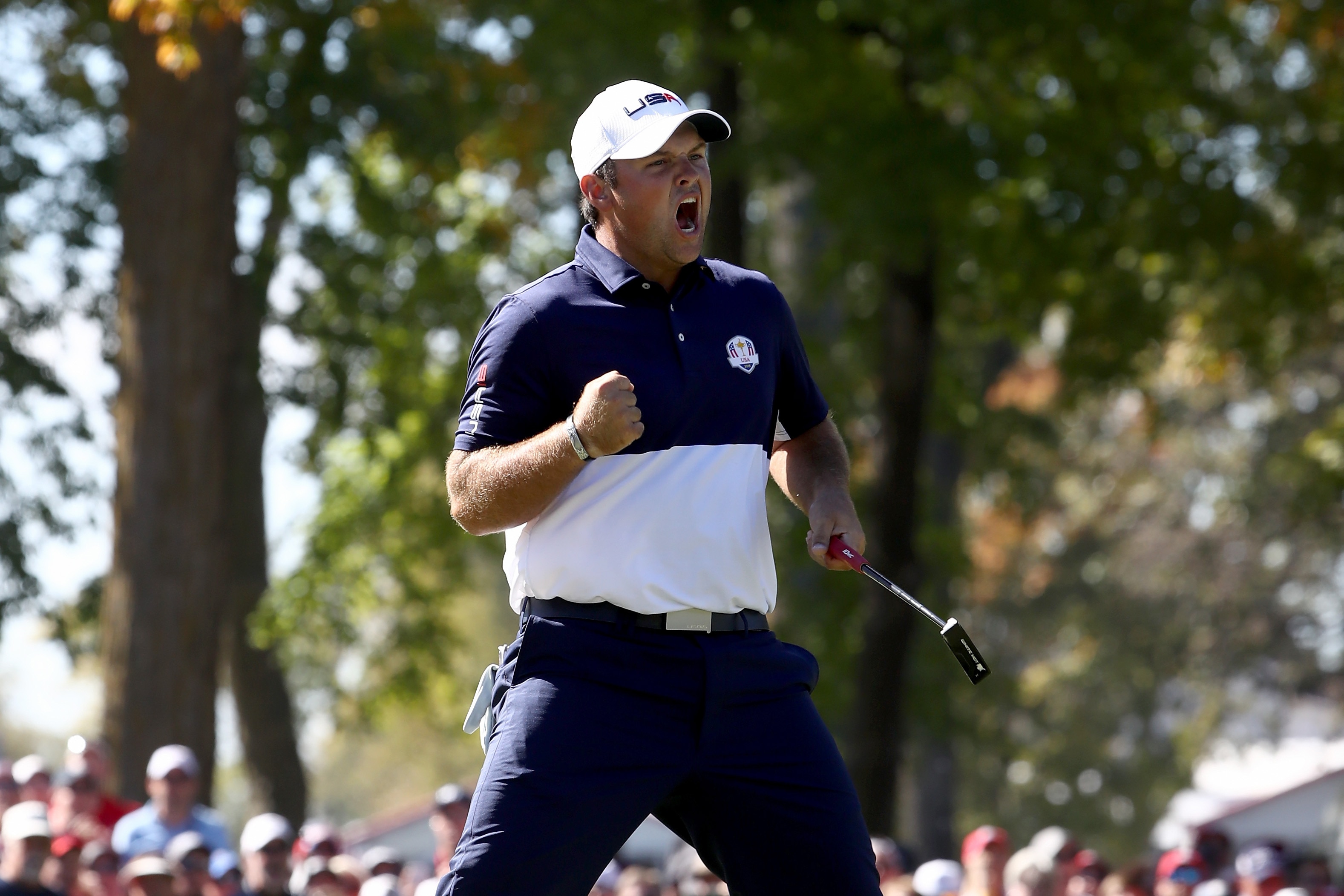 CHASKA, MN - OCTOBER 02: Patrick Reed of the United States reacts on the 12th green during singles matches of the 2016 Ryder Cup at Hazeltine National Golf Club on October 2, 2016 in Chaska, Minnesota. (Photo by Sam Greenwood/Getty Images)