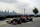 David Coulthard drives a Red Bull F1 car with the Manhattan skyline in the background.