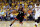 CLEVELAND, OH - MAY 25: Kyle Lowry #7 of the Toronto Raptors handles the ball in the first quarter against Kyrie Irving #2 of the Cleveland Cavaliers in game five of the Eastern Conference Finals during the 2016 NBA Playoffs at Quicken Loans Arena on May 25, 2016 in Cleveland, Ohio. NOTE TO USER: User expressly acknowledges and agrees that, by downloading and or using this photograph, User is consenting to the terms and conditions of the Getty Images License Agreement.  (Photo by Andy Lyons/Getty Images)