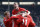 Roy Keane celebrates with his United team-mates.