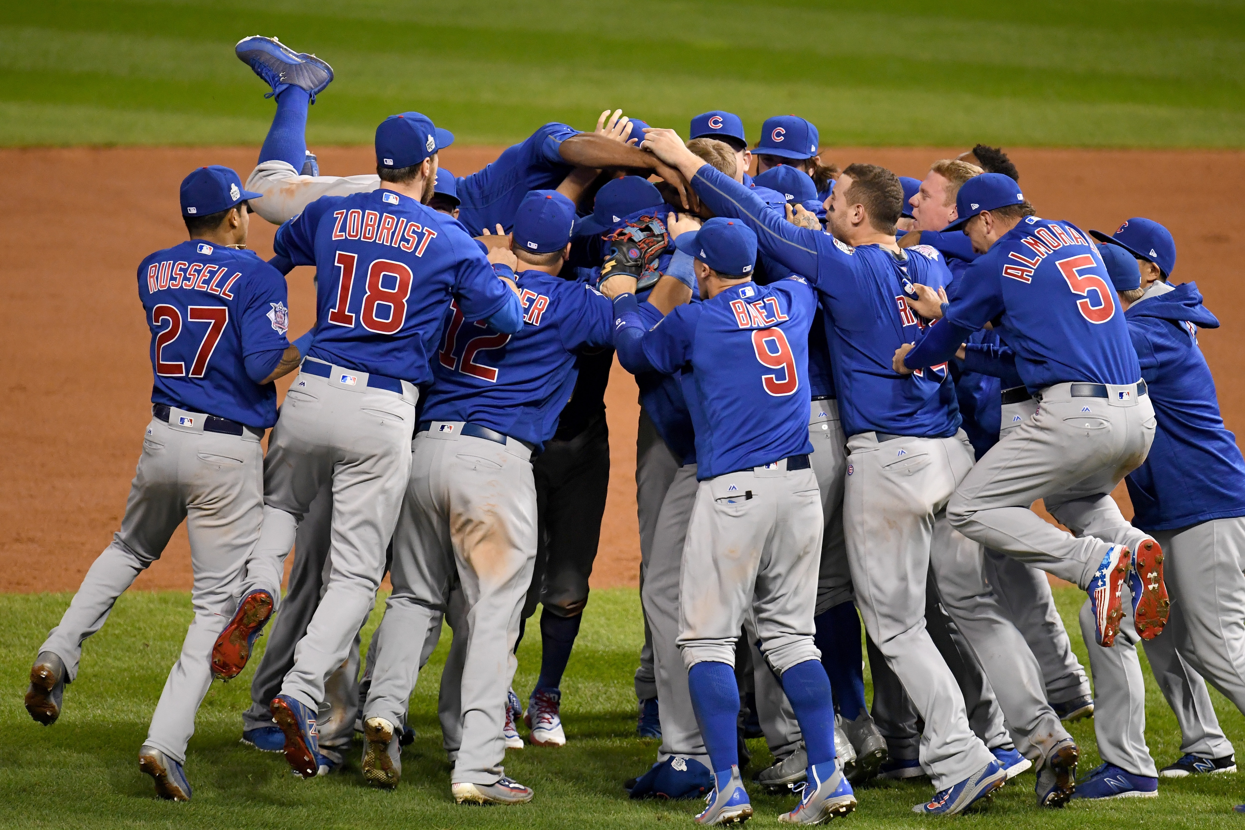 CLEVELAND, OH - NOVEMBER 02: The Chicago Cubs celebrate after defeating the Cleveland Indians 8-7 in Game Seven of the 2016 World Series at Progressive Field on November 2, 2016 in Cleveland, Ohio. The Cubs win their first World Series in 108 years. (Photo by Jason Miller/Getty Images)