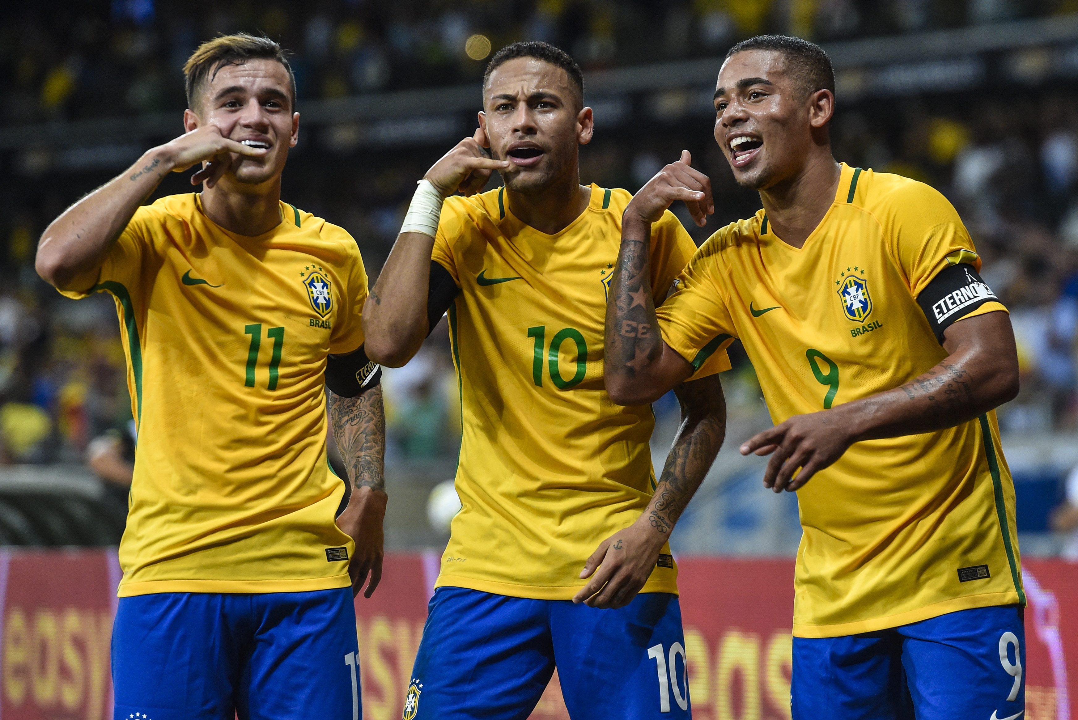 BELO HORIZONTE, BRAZIL - NOVEMBER 10: Philippe Coutinho #11, Neymar #10 and Gabriel Jesus #9 of Brazil celebrates a scored goal against Argentina during a match between Brazil and Argentina as part 2018 FIFA World Cup Russia Qualifier at Mineirao stadium on November 10, 2016 in Belo Horizonte, Brazil. (Photo by Pedro Vilela/Getty Images)