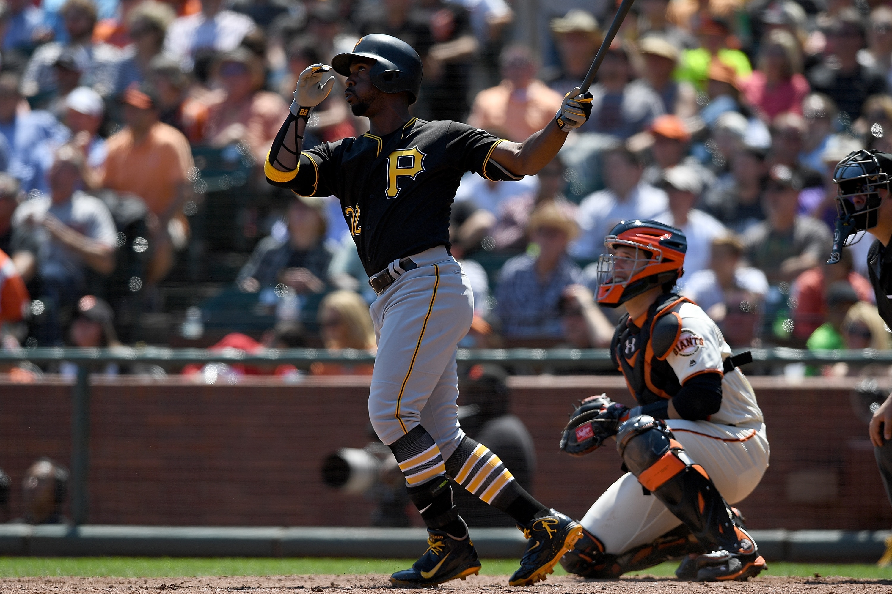SAN FRANCISCO, CA - AUGUST 17: Andrew McCutchen #22 of the Pittsburgh Pirates swings and watches the flight of his ball as he hits a two-run homer against the San Francisco Giants in the top of the fifth inning at AT&T Park on August 17, 2016 in San Francisco, California. (Photo by Thearon W. Henderson/Getty Images)