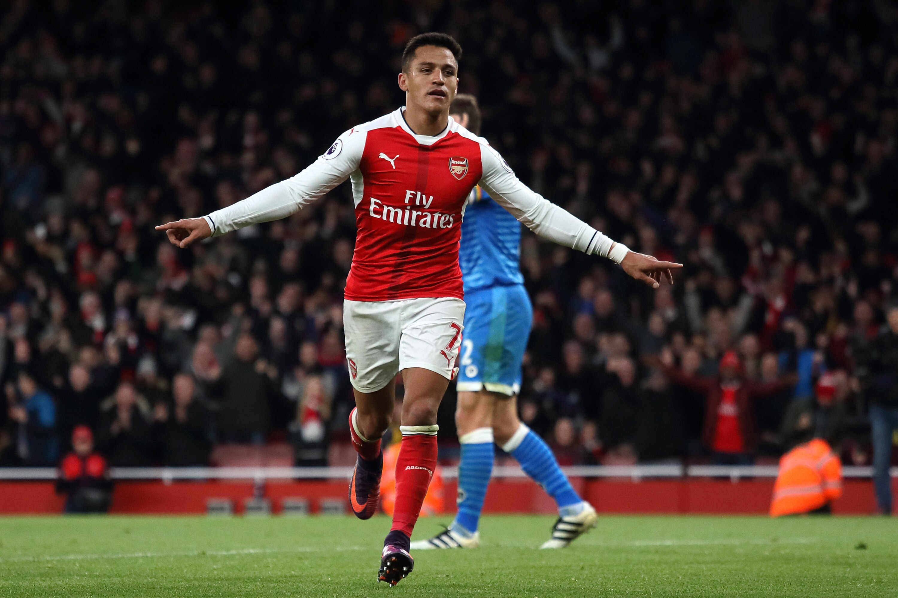 LONDON, ENGLAND - NOVEMBER 27: Alexis Sanchez of Arsenal celebrates scoring his team's third goal during the Premier League match between Arsenal and AFC Bournemouth at Emirates Stadium on November 27, 2016 in London, England. (Photo by Matthew Ashton - AMA/Getty Images)