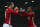 Manchester United's Anthony Martial, right, celebrates with teammate Manchester United's Zlatan Ibrahimovic after scoring his side 2nd goal of the game during the English League Cup quarterfinal soccer match between manchester United and West Ham United at Old Trafford in Manchester, England Wednesday, Nov. 30, 2016. (AP Photo/Dave Thompson)