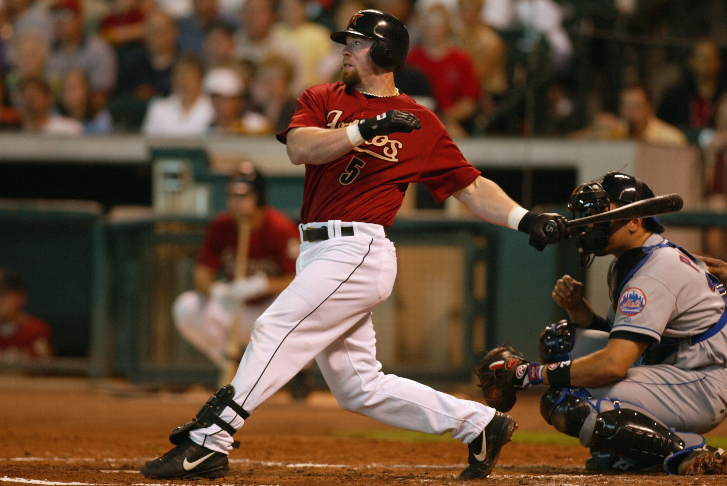 HOUSTON - MAY 5 : First baseman Jeff Bagwell #5 of the Houston Astros watches the flight of the ball during the MLB game against the New York Mets at Astro Field in Houston, Texas on May 5, 2002. The Astros won 12-1. (Photo by Tom Hauck/Getty Images)