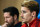Atletico Madrid's French midfielder Antoine Griezmann (R) speaks next to Atletico Madrid's head coach Diego Simeone (L) during a press conference at Luz stadium in Lisbon, on December 7, 2015 on the eve of the UEFA Champions League Group C football match between SL Benfica vs Atletico de Madrid.    / AFP / PATRICIA DE MELO MOREIRA        (Photo credit should read PATRICIA DE MELO MOREIRA/AFP/Getty Images)