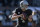 OAKLAND, CA - DECEMBER 24:  Derek Carr #4 of the Oakland Raiders rolls out to pass against the Indianapolis Colts during the first quarter of their NFL football game at the Oakland-Alameda County Coliseum on December 24, 2016 in Oakland, California.  (Photo by Thearon W. Henderson/Getty Images)