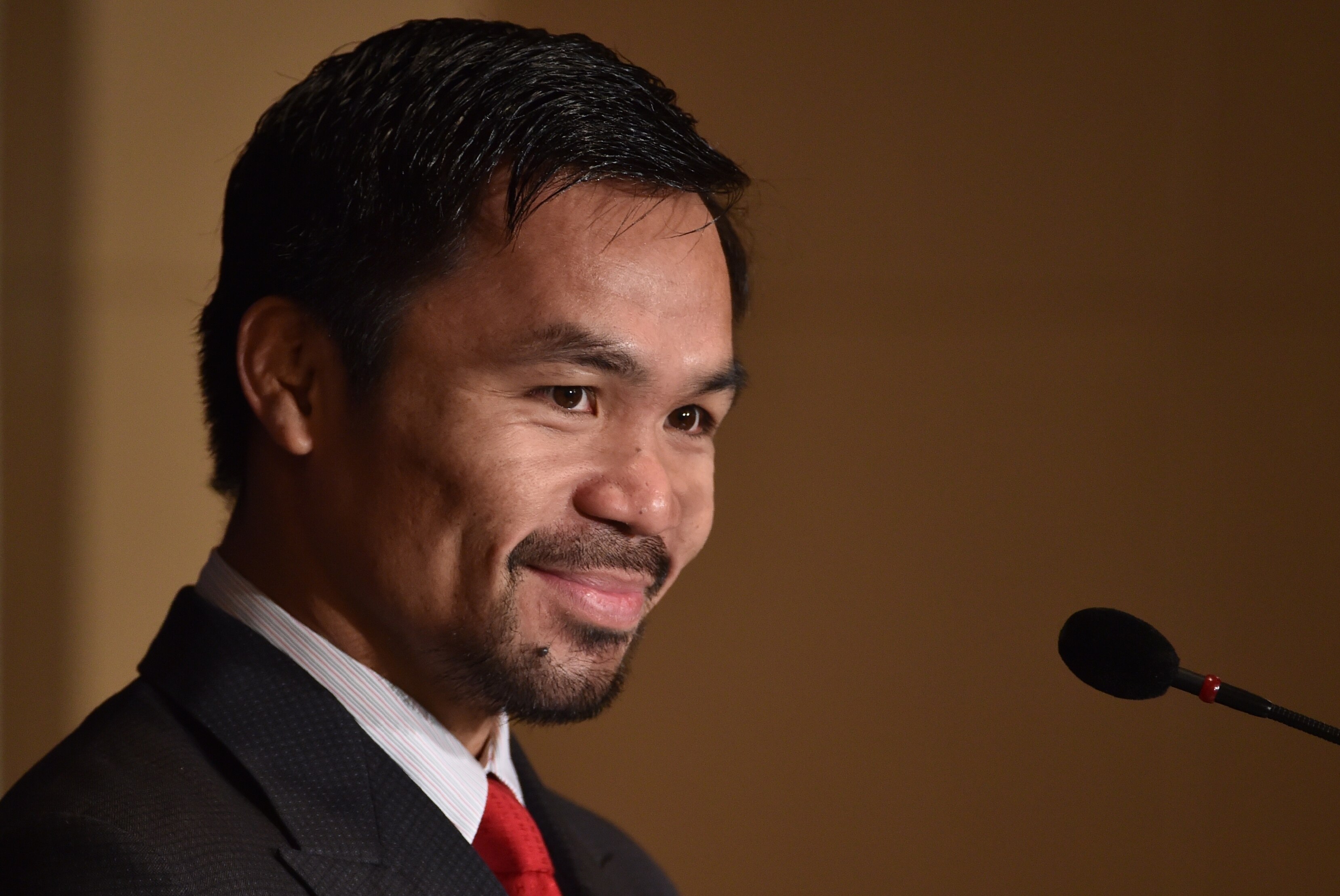 WBO welterweight world champion Manny Pacquiao attends a press conference at the Foreign Correspondents' Club of Japan prior to his press conference in Tokyo on November 26, 2016.
Pacquiao is in Japan to launch his first fitness gym 'PACQUIAO GYM TOKYO JAPAN' in Harajuku, Tokyo. / AFP / KAZUHIRO NOGI (Photo credit should read KAZUHIRO NOGI/AFP/Getty Images)