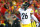 KANSAS CITY, MP - JANUARY 15:  Running back Le'Veon Bell #26 of the Pittsburgh Steelers tosses the ball forward after gaining a first down against the Kansas City Chiefs during the first quarter in the AFC Divisional Playoff game at Arrowhead Stadium on January 15, 2017 in Kansas City, Missouri.  (Photo by Dilip Vishwanat/Getty Images)