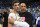Mar 4, 2017; Los Angeles, CA, USA; Lavar Ball embraces his son UCLA Bruins guard Lonzo Ball (2) after the game against the Washington State Cougars at Pauley Pavilion. Mandatory Credit: Richard Mackson-USA TODAY Sports