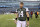 FILE - in this Jan. 1, 2017, file photo, New York Jets quarterback Ryan Fitzpatrick walks off the field after the team's NFL football game against the Buffalo Bills in East Rutherford, N.J. Fitzpatrick's contract with the Jets has voided, as expected, making the veteran quarterback a free agent. Fitzpatrick re-signed with the Jets last July on a one-year, $12 million deal. Technically, the contract was for two years, but contained language in which the second year would be automatically voided five days after the Super Bowl--meaning, Friday--if Fitzpatrick remained on the roster. (AP Photo/Bill Kostroun, File)