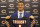Chicago Bears' first round draft pick quarterback Mitchell Trubisky, from North Carolina, poses with a Bears' jersey during an NFL football news conference Friday, April 28, 2017, in Lake Forest , Ill. (AP Photo/Charles Rex Arbogast)