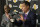 Magic Johnson, left, listens as Rob Pelinka talks during a news conference introducing him as the new general manager for the Los Angeles Lakers, in El Segundo, Calif., Friday, March 10, 2017. The Lakers introduced Pelinka, Kobe Bryant's longtime agent, as their new general manager. Pelinka will work with Johnson to rebuild the 16-time NBA champions from the worst four-year stretch in team history. (AP Photo/Nick Ut)