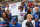 CHICAGO - OCTOBER 01:  One of the Chicago Cubs' most famous fans Ronnie Woo-Woo Wickers (C) celebrates the team making it into the playoffs with other fans at a lunch-time rally downtown October 1, 2007 in Chicago, Illinois. This is the first time the Cubs have been in the playoffs since 2003. They haven't been in the World Series since 1945 and haven't won a Series since 1908.  (Photo by Scott Olson/Getty Images)