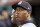 New York Yankees relief pitcher Aroldis Chapman sits in the dugout in the ninth inning of a baseball game against the Cincinnati Reds, Monday, May 8, 2017, in Cincinnati. The Yankees won 10-4. (AP Photo/John Minchillo)