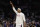 Los Angeles Clippers' Paul Pierce acknowledges the fans after the team showed a tribute video for him during an NBA basketball game against the Sacramento Kings on Wednesday, April 12, 2017, in Los Angeles. The Clippers won 115-95. (AP Photo/Jae C. Hong)
