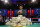 Qui Nguyen poses for photographers after winning the World Series of Poker Main Event, Wednesday, Nov. 2, 2016, in Las Vegas. (AP Photo/John Locher)