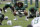New York Jets defensive lineman Leonard Williams stretches with teammates during the team's organized team activities at its NFL football training facility, Tuesday, May 23, 2017, in Florham Park, N.J. (AP Photo/Julio Cortez)