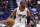 Los Angeles Clippers' Chris Paul dribbles the ball against the Phoenix Suns during the first half of an NBA basketball game Thursday, March 30, 2017, in Phoenix. (AP Photo/Ross D. Franklin)