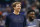 Dallas Mavericks forward Dirk Nowitzki, left, and teammate Wesley Matthews laugh during pre-game warm up before an NBA basketball game against the Phoenix Suns, Sunday, April 9, 2017, in Phoenix. The Suns defeated the Mavericks 124-111. (AP Photo/Ralph Freso)