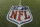 The NFL shield logo is shown painted on the field at Sports Authority Field at Mile High before an NFL football game between the Denver Broncos and the Oakland Raiders, Sunday, Jan. 1, 2017, in Denver. (AP Photo/Jack Dempsey)