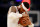 NEW YORK, NY - APRIL 12:  Carmelo Anthony #7 of the New York Knicks hugs the ball before the opening tipoff against the Philadelphia 76ers at Madison Square Garden on April 12, 2017 in New York City. NOTE TO USER: User expressly acknowledges and agrees that, by downloading and or using this Photograph, user is consenting to the terms and conditions of the Getty Images License Agreement  (Photo by Elsa/Getty Images)