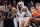 New York Knicks' Carmelo Anthony, center, watches during the second half of an NBA basketball game against the Philadelphia 76ers Wednesday, April 12, 2017, in New York. The Knicks won 114-113. (AP Photo/Frank Franklin II)