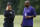 Baltimore Ravens head coach John Harbaugh, left, and general manager and executive vice president Ozzie Newsome watch an NFL football training camp practice in Owings Mills, Md., Friday, July 28, 2017. (AP Photo/Patrick Semansky)