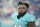 FILE - In this Aug. 25, 2016, file photo, Miami Dolphins wide receiver Jarvis Landry (14) warms up before an NFL preseason football game against the Atlanta Falcons in Orlando, Fla. Two people familiar with the situation said Landry has been fined $24,309 for an illegal crackback block that injured Buffalo Bills safety Aaron Williams. The people confirmed the fine to The Associated Press on condition of anonymity Thursday, Oct. 27, because the NFL had not yet announced the fine. (AP Photo/Phelan M. Ebenhack, File)