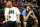 LOS ANGELES, CA - AUGUST 13:  (L-R) Lavar Ball and LaMelo Ball look on from the audience during week eight of the BIG3 three on three basketball league at Staples Center on August 13, 2017 in Los Angeles, California.  (Photo by Sean M. Haffey/Getty Images)