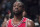 Chicago Bulls guard Dwyane Wade (3) watches the game action from the bench during the second half of an NBA basketball game against the Brooklyn Nets, Saturday, April 8, 2017, in New York. The Nets won 107-106. (AP Photo/Mary Altaffer)