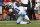 Dallas Cowboys running back Ezekiel Elliott (21) is tackled by Denver Broncos cornerback Chris Harris during the second half of an NFL football game, Sunday, Sept. 17, 2017, in Denver. (AP Photo/Jack Dempsey)