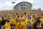 Iowa fans wave to children in the University of Iowa Stead Family Children's Hospital at the end of the first quarter of an NCAA college football game against North Texas, Saturday, Sept. 16, 2017, in Iowa City, Iowa. (AP Photo/Charlie Neibergall)