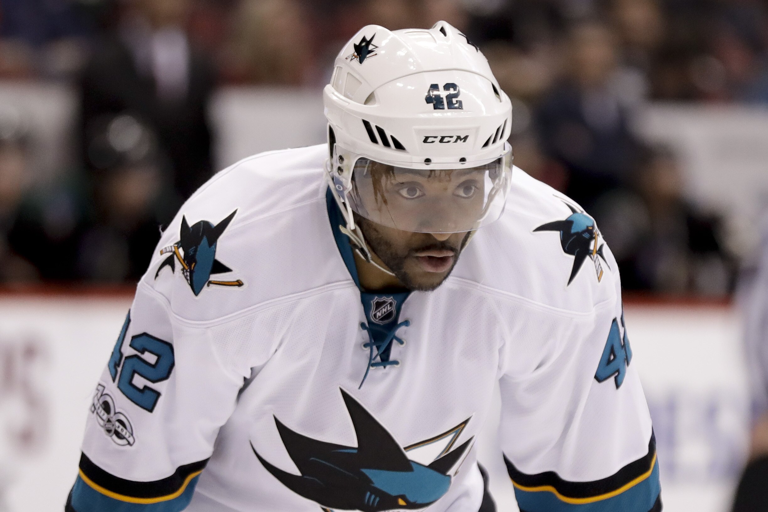 San Jose Sharks right wing Joel Ward lines up against the Arizona Coyotes during the third period of an NHL hockey game in Glendale, Ariz., Saturday, Feb. 18, 2017. (AP Photo/Chris Carlson)