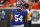 New York Giants defensive end Olivier Vernon warms up before an NFL football game against the Cleveland Browns, Monday, Aug. 21, 2017, in Cleveland. (AP Photo/Ron Schwane)