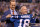 INDIANAPOLIS, IN - OCTOBER 08: Peyton Manning and Jim Irsay, owner of the Indianapolis Colts, pose for photos during a ceremony retiring Manning's jersey during the halftime of the game between the Indianapolis Colts and the San Francisco 49ers at Lucas Oil Stadium on October 8, 2017 in Indianapolis, Indiana.  (Photo by Bobby Ellis/Getty Images)