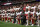 PHOENIX, AZ - OCTOBER 1: The San Francisco 49ers kneel and stand in solidarity on the sideline, during the anthem, prior to the game against the Arizona Cardinals at the University of Phoenix Stadium on October 1, 2017 in Phoenix, Arizona. The Cardinals defeated the 49ers 18-15. (Photo by Michael Zagaris/San Francisco 49ers/Getty Images)  *** Local Caption ***