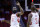 Houston Rockets guard James Harden (13) and Chris Paul (3 )high five in the first half of an NBA exhibition basketball game against the Shanghai Sharks Thursday, Oct. 5, 2017, in Houston. (AP Photo/Michael Wyke)