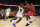 OAKLAND, CA - OCTOBER 17:  Jordan Bell #2 of the Golden State Warriors drives to the hoop against James Harden #13 of the Houston Rockets during their NBA game at ORACLE Arena on October 17, 2017 in Oakland, California. NOTE TO USER: User expressly acknowledges and agrees that, by downloading and or using this photograph, User is consenting to the terms and conditions of the Getty Images License Agreement.  (Photo by Ezra Shaw/Getty Images)