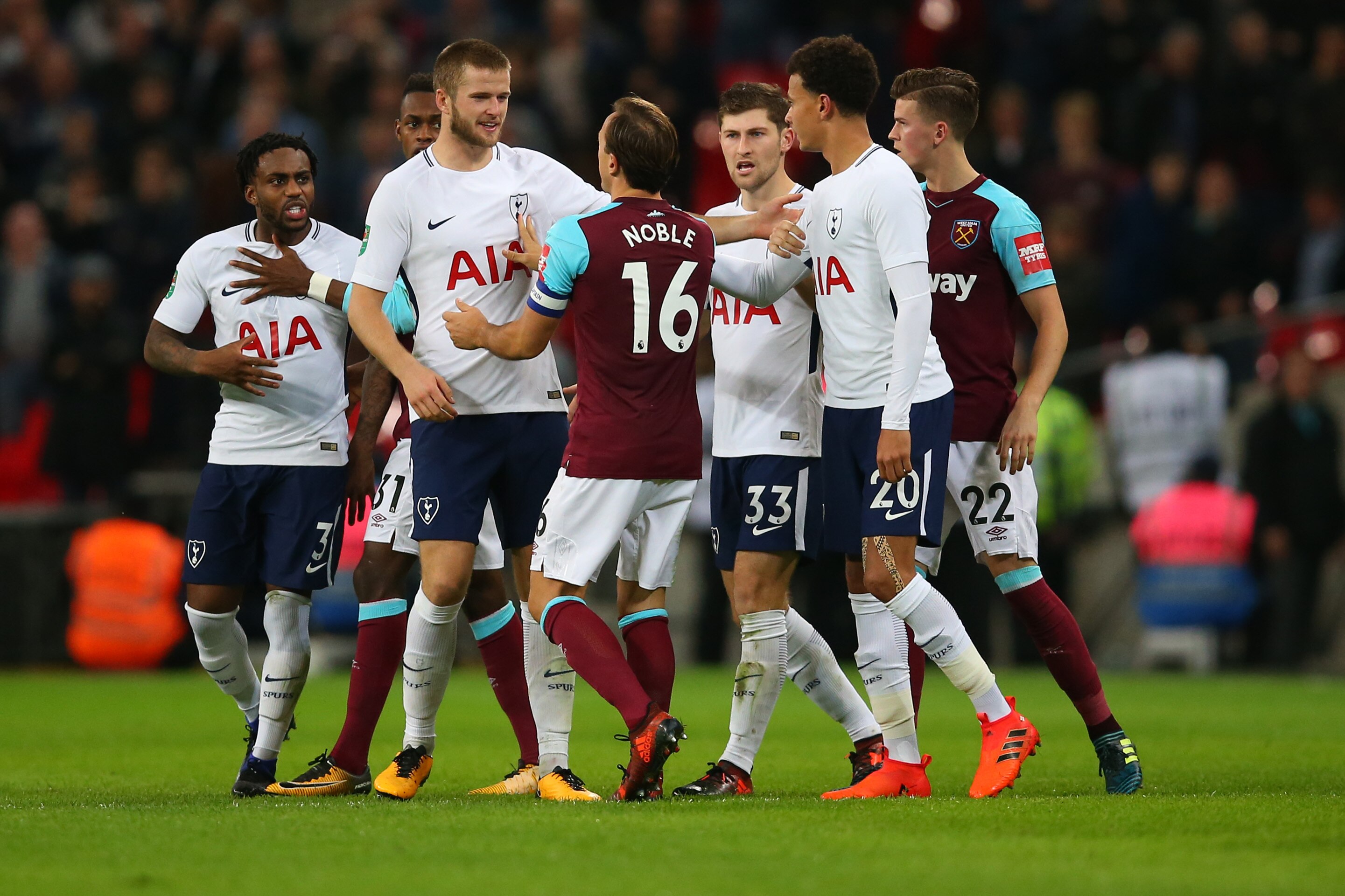 LONDON, ENGLAND - OCTOBER 25: Mark Noble of West Ham United is held back by Eric Dier of Tottenham Hotspur as tempers flare with Danny Rose of Tottenham Hotspur during the Carabao Cup Fourth Round match between Tottenham Hotspur and West Ham United at Wembley Stadium on October 25, 2017 in London, England. (Photo by Catherine Ivill - AMA/Getty Images)