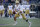 UCLA quarterback Josh Rosen scrambles against Washington in the first half of an NCAA college football game Saturday, Oct. 28, 2017, in Seattle. (AP Photo/Elaine Thompson)