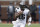 Ohio State quarterback J.T. Barrett rushes during the first half of an NCAA college football game against Michigan, Saturday, Nov. 25, 2017, in Ann Arbor, Mich. (AP Photo/Carlos Osorio)