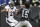 Denver Broncos cornerback Aqib Talib (21) fights Oakland Raiders wide receiver Michael Crabtree (15) during the first half of an NFL football game in Oakland, Calif., Sunday, Nov. 26, 2017. (AP Photo/Ben Margot)